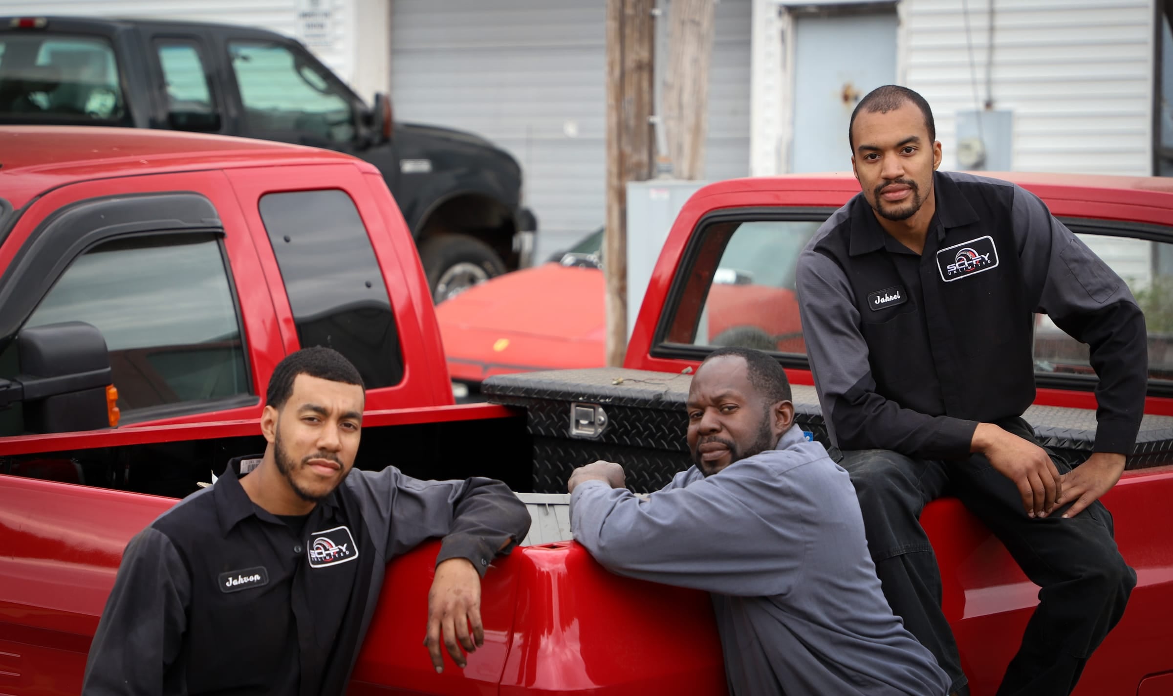 The Sci-Fy Unlimited crew with a red diesel pickup
